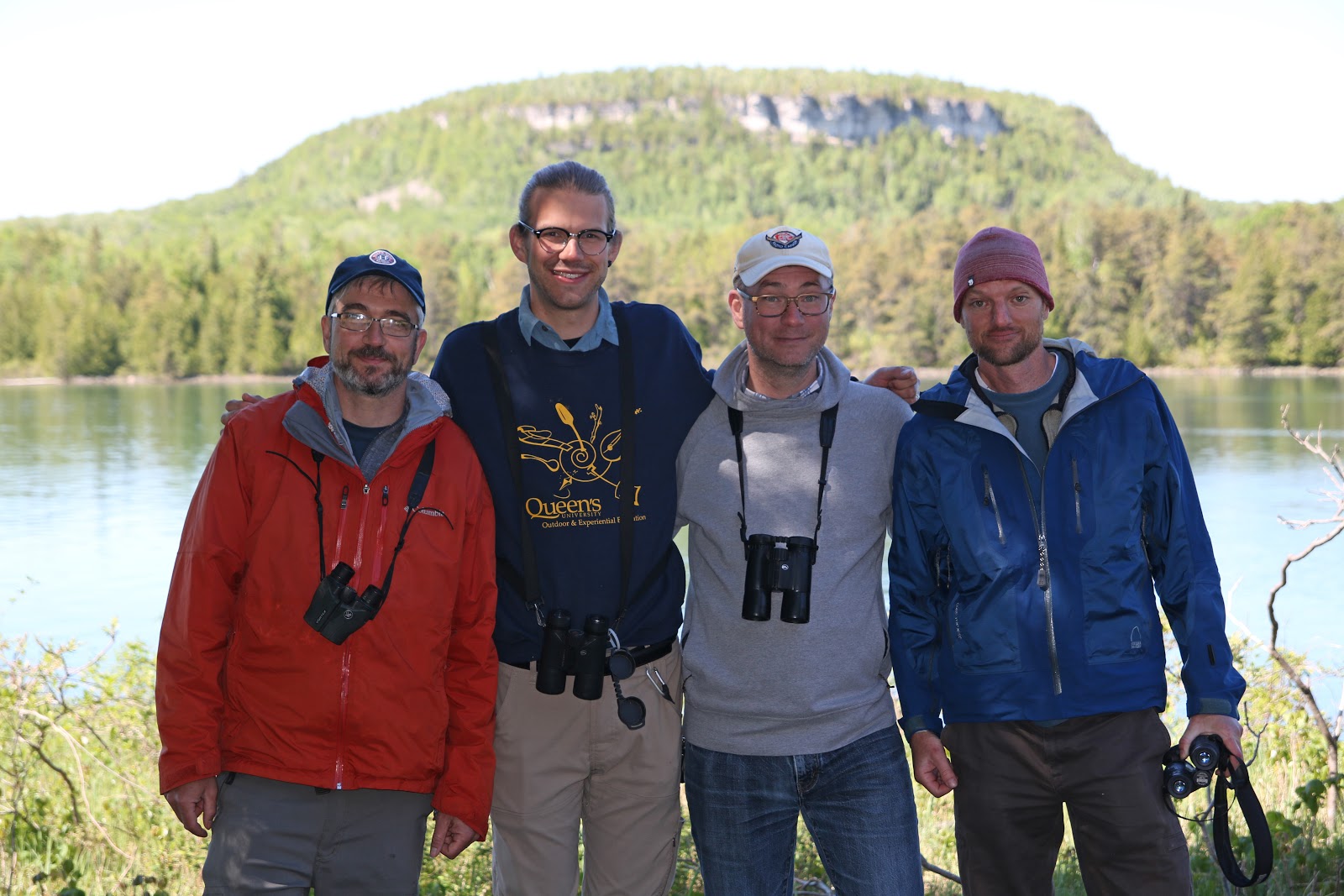 A photograph of four of the Outdoor Education staff members.