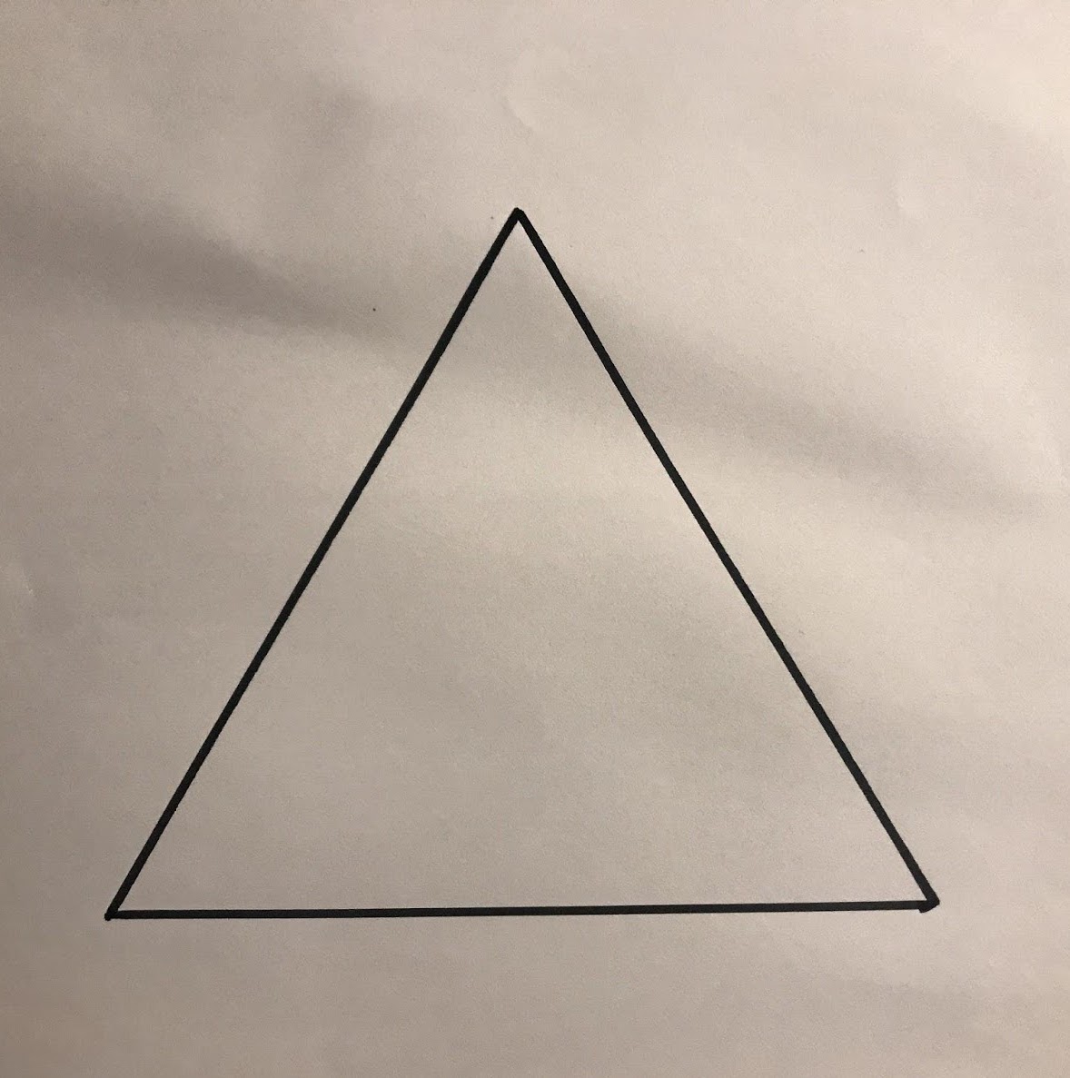 Outline sketch of an equilateral triangle.