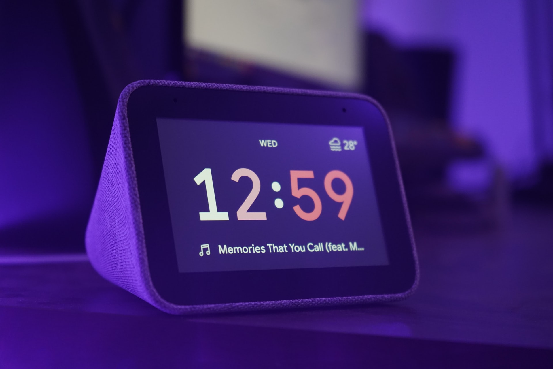 Photograph of an alarm clock with a digital time display.