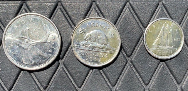 Picture of quarter, nickel, dime.