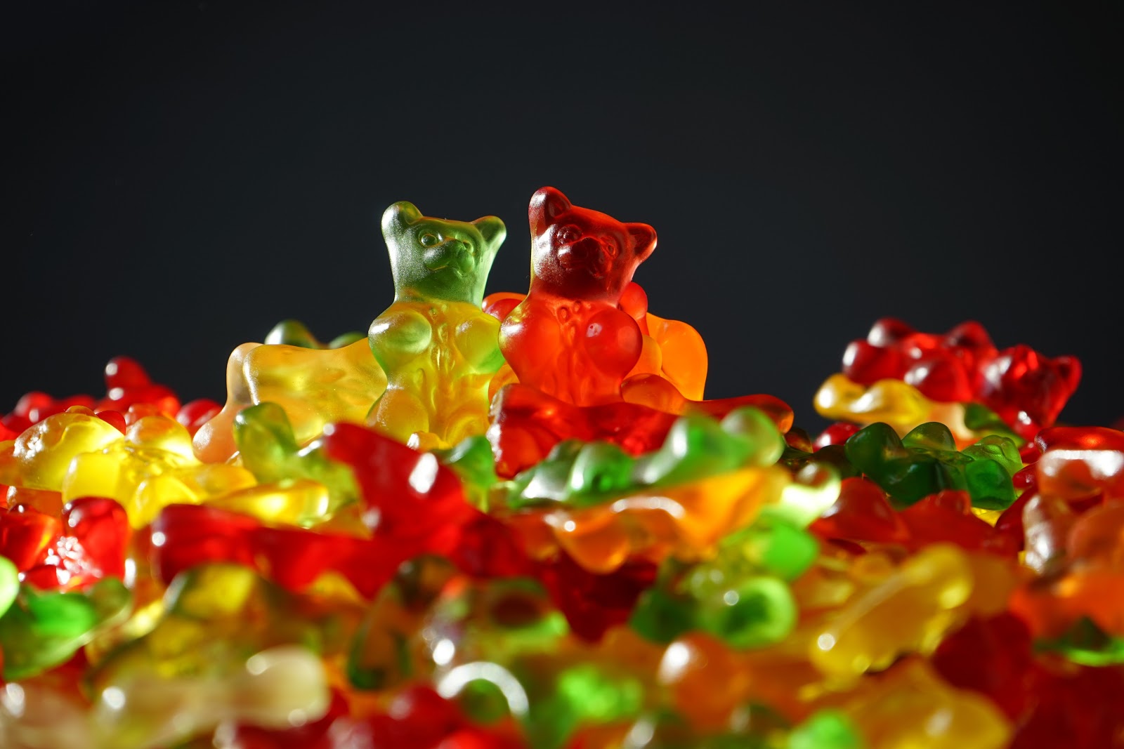 Picture of a pile of gummy bears in a variety of colours